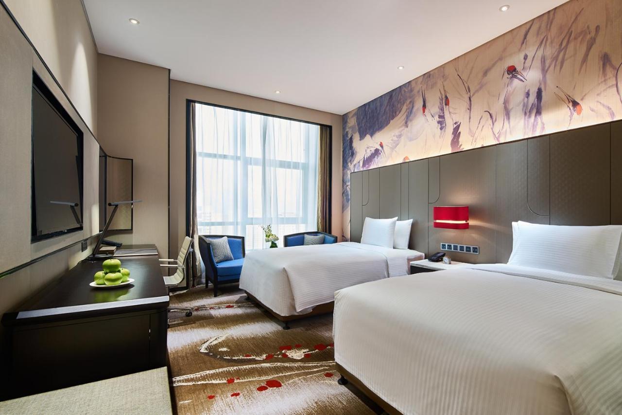 Wanda Realm Qiqihar Hotel Exterior photo